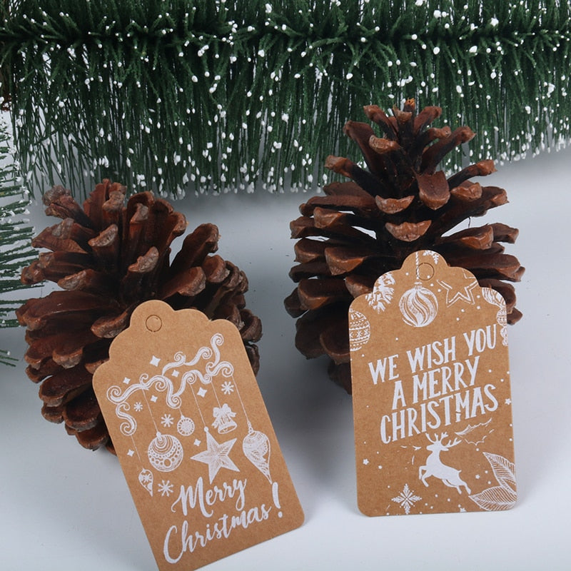 Cyuan 50pcs Christmas Gift Tags Santa Claus Snowflake Kraft Paper Tag with rope Label Xmas Gift for Xmas Party DIY Supplies